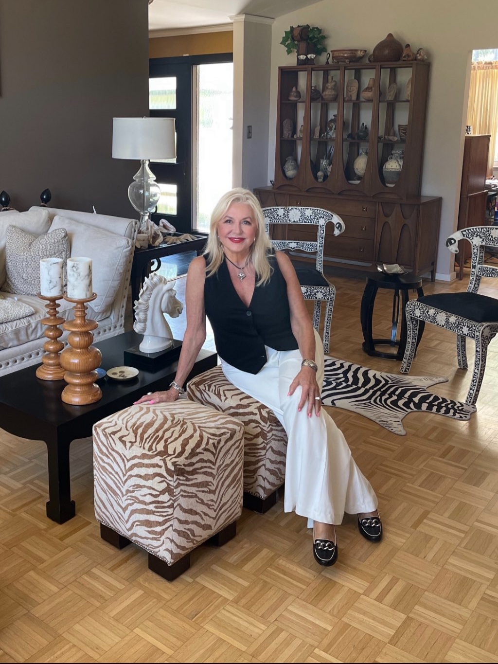 Premier Real Estate, Newport News VA, Carmen relaxing at home in her living room